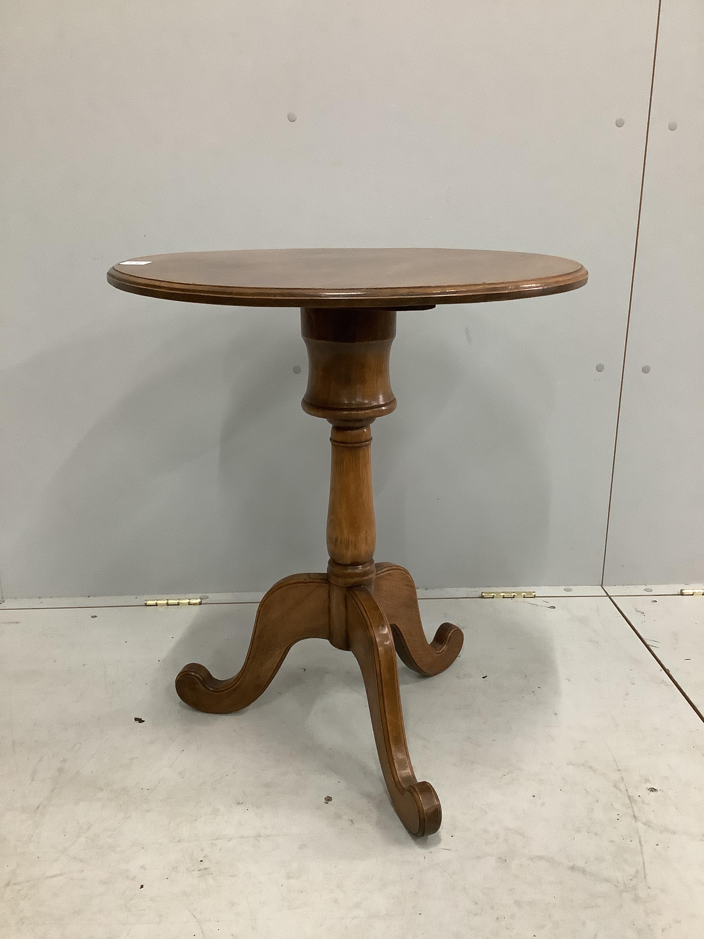 A Victorian style circular walnut tripod wine table, diameter 60cm, height 69cm